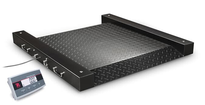 Low-profile drum scale with a diamond-plate deck, side rails, and a cabled weight indicator
