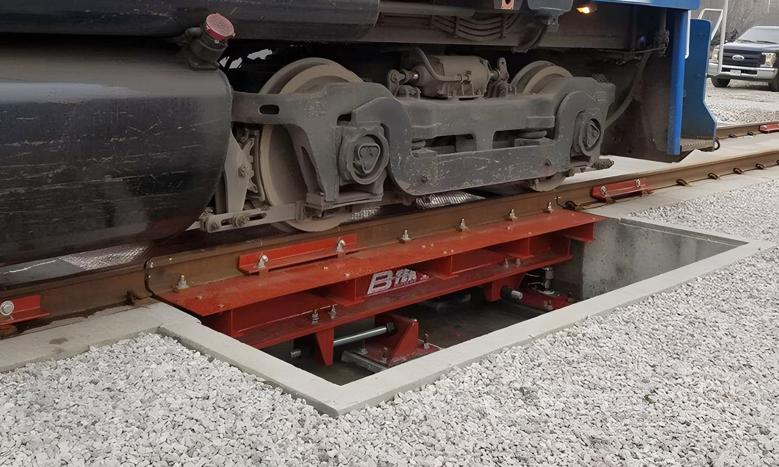 Locomotive wheels at rest on a rail scale weighbridge