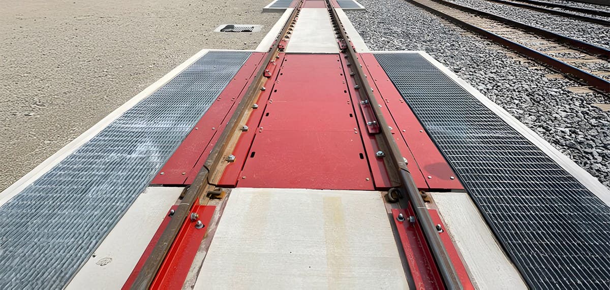 Rail scale weighbridge set into the track between steel grating