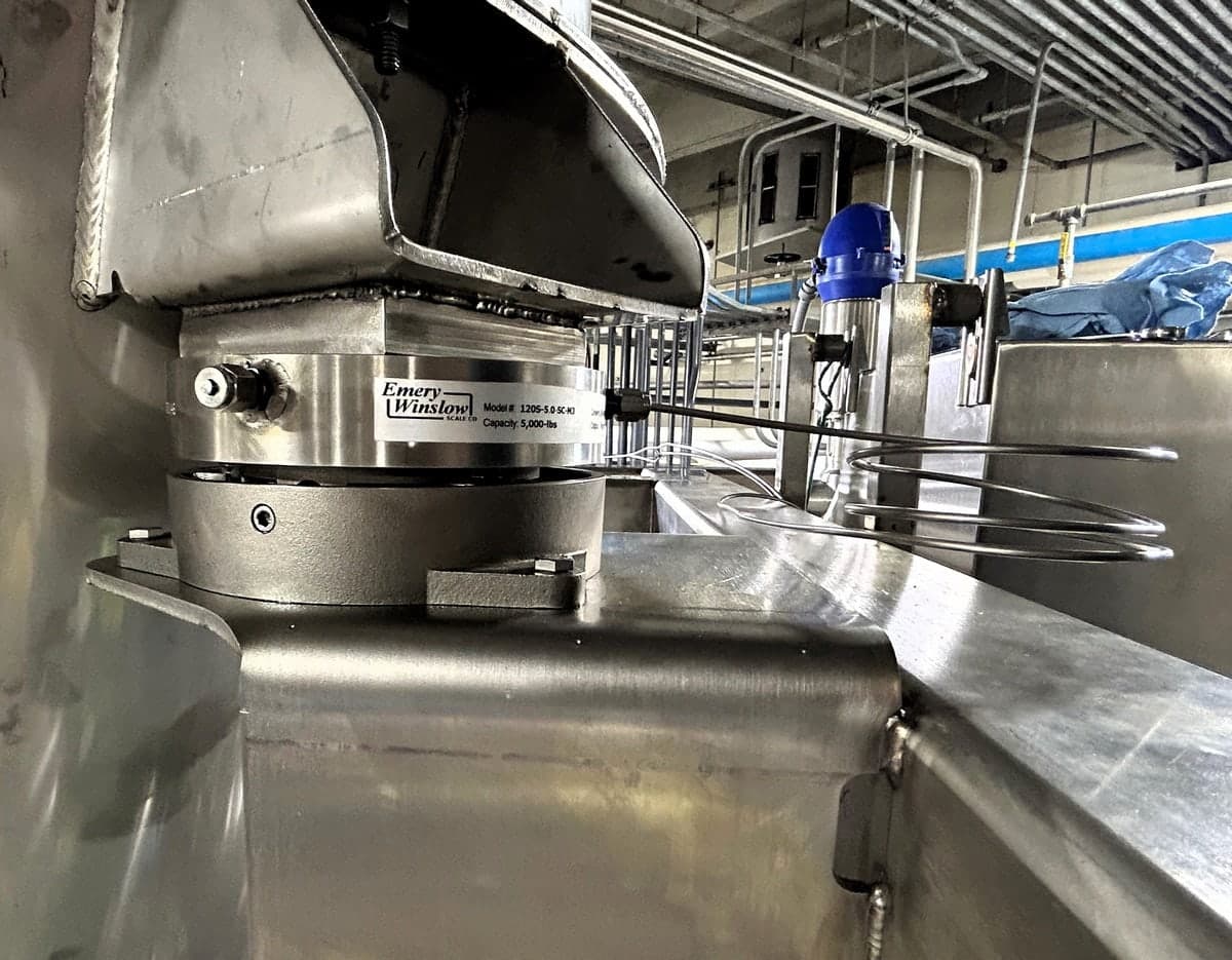 Weigh module installed under a stainless process vessel